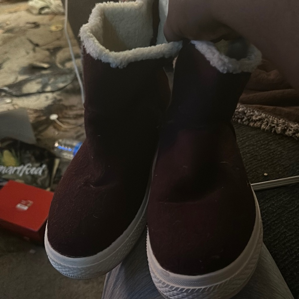 Medina size 9.5 suede booties with zipper at the back.